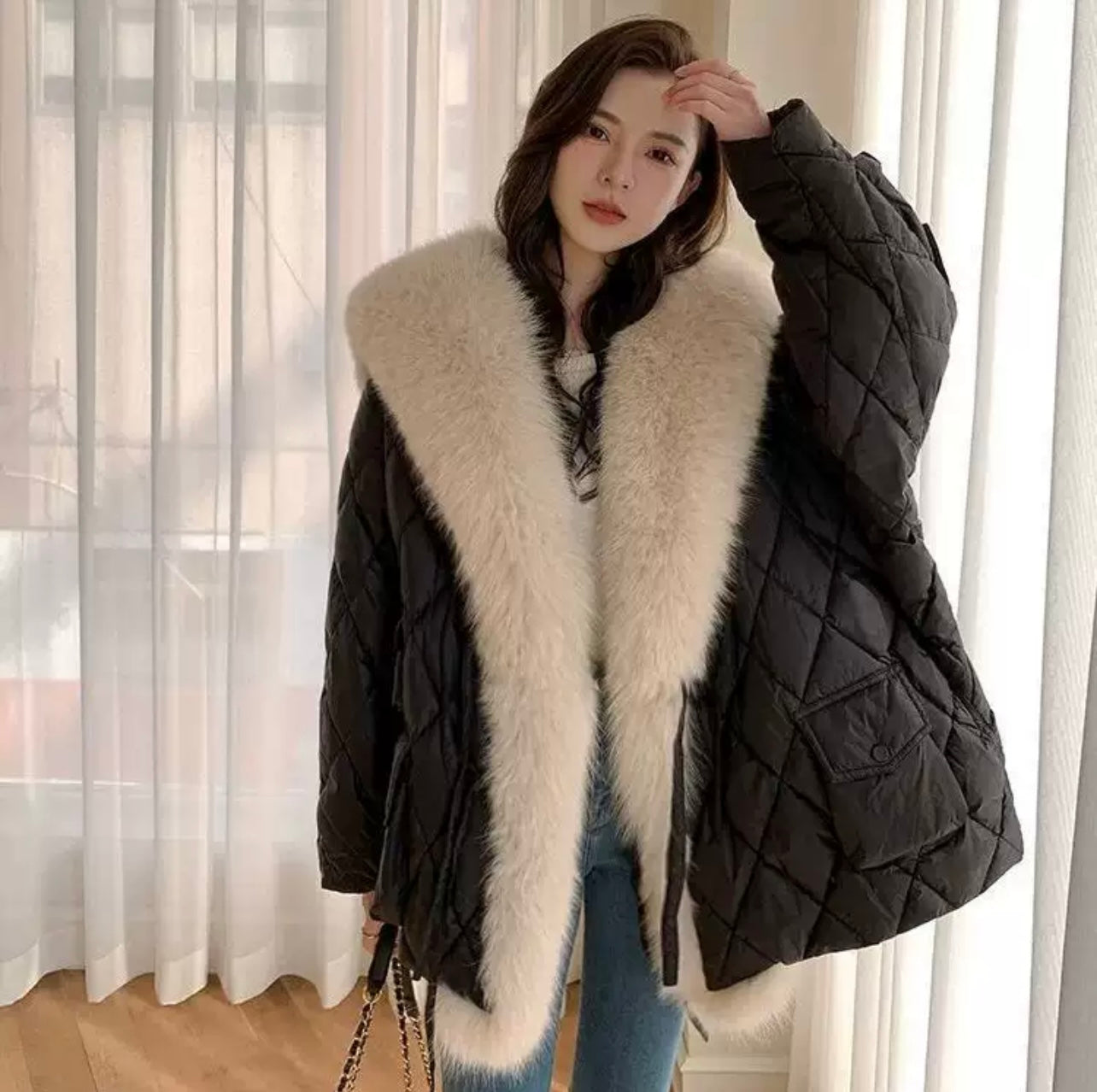 Gesteppte Jacke mit Fell