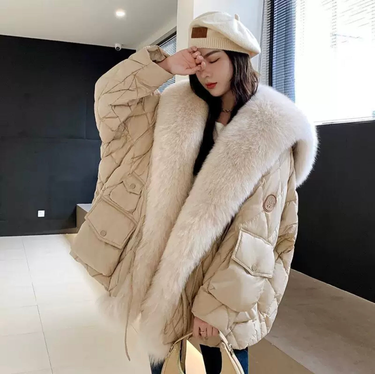 Gesteppte Jacke mit Fell